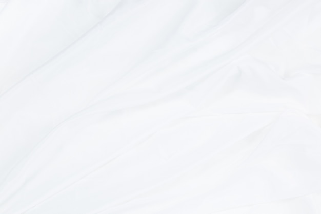 Abstrato de pano branco com ondas suavescloseup elegante amassado