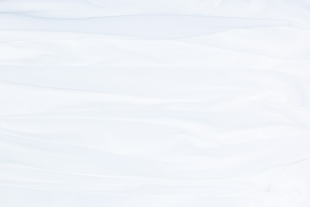 Abstrato de pano branco com ondas suavescloseup elegante amassado