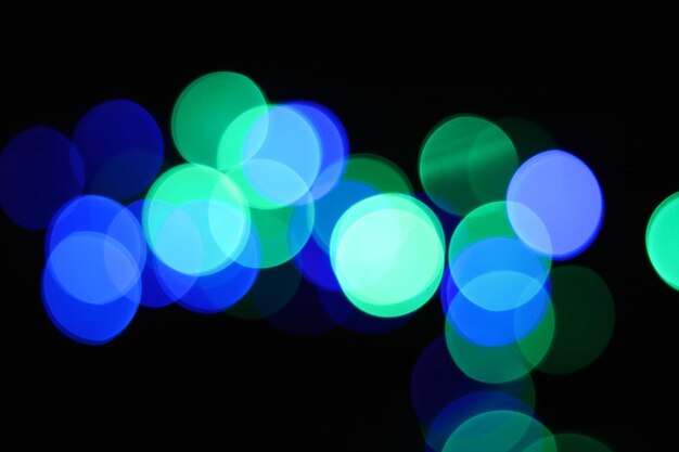 abstrato verde e azul urbano realista desfocado brilho luz textura colorida em preto