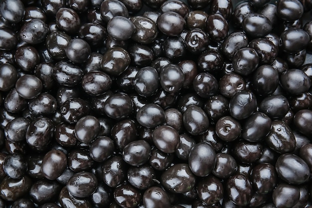 Aceitunas negras enlatadas como fondo