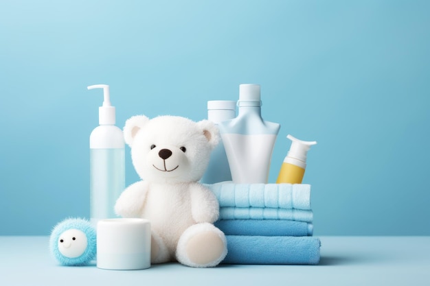 Foto acessórios de banho para bebês garrafas de shampoo com urso branco e toalhas azuis