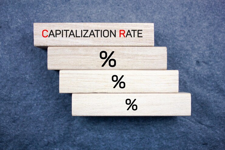 Foto acrónimo de texto en bloques de madera tipo de capitalización concepto financiero de tasa de capitalización