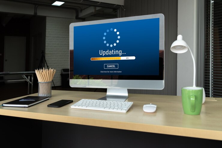 Foto actualización de software en la computadora para la versión más moderna del software del dispositivo
