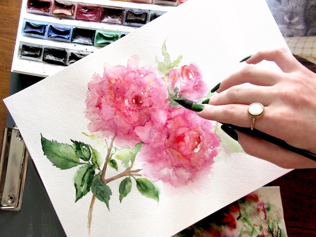 Acuarela flor rosa peonía rosa composición floral planta pintura paleta pincel pincel mano arte creativo dibujo foto