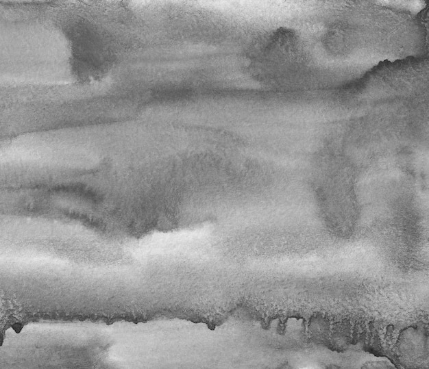 Acuarela tranquila textura de fondo líquido gris. Manchas monocromas en papel superpuesto. Pintura abstracta aquarelle blanco y negro.