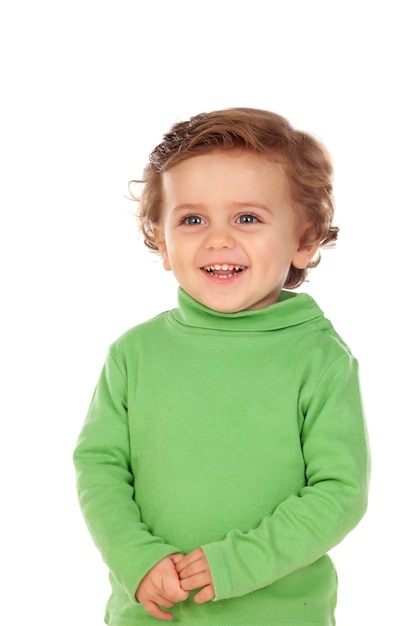 Adorable bebé con camisa verde