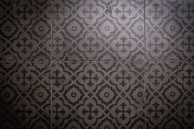Foto adorno tradicional de azulejos españoles. azulejo. fondo negro.
