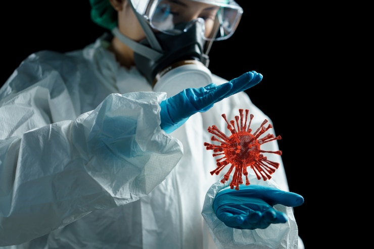Foto ärztin in weißem schutzanzug aus hazmat, schutzbrille und atemschutzmaske mit erreger der atemwege in der hand