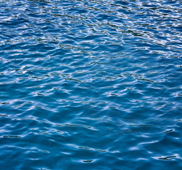 Foto Água do mar com ondas abstrato mar de água azul para fundo