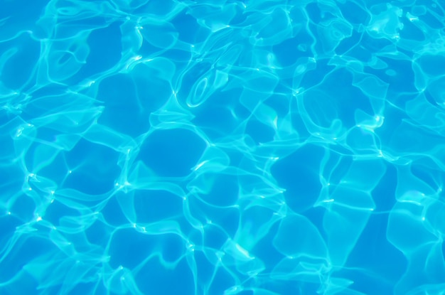 Foto el agua en la piscina ondulada el fondo de detalle del agua