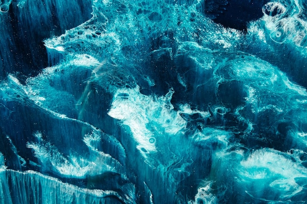 Agua de tinta acrílica azul Textura de mármol Superficie congelada con efecto de mota de hielo de nieve blanca Patrón de racha de roca de cristal natural Fondo abstracto oriental
