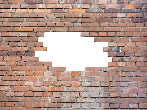 Un agujero en blanco en una pared de ladrillo