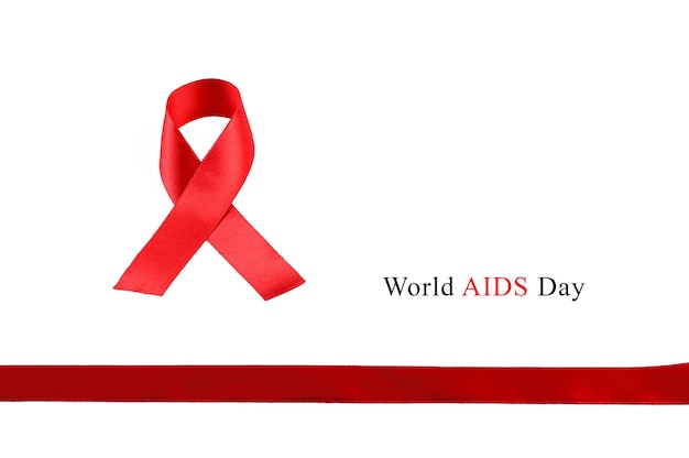 Foto aids awareness red ribbon em fundo branco.