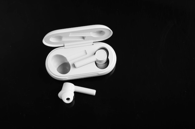 Air Pods o auriculares con estuche de carga inalámbrica