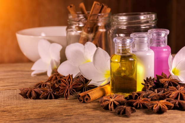 Foto ajuste de spa y aceite de fragancia natural con objetos naturales en madera