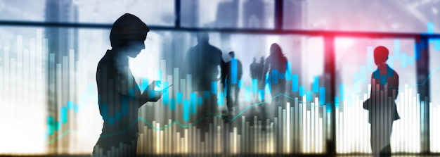 Aktienhandel Candlestick Chart und Diagramme auf verschwommenem Hintergrund im Bürozentrum