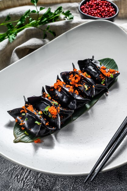 Albóndigas al vapor Dim Sum en un plato