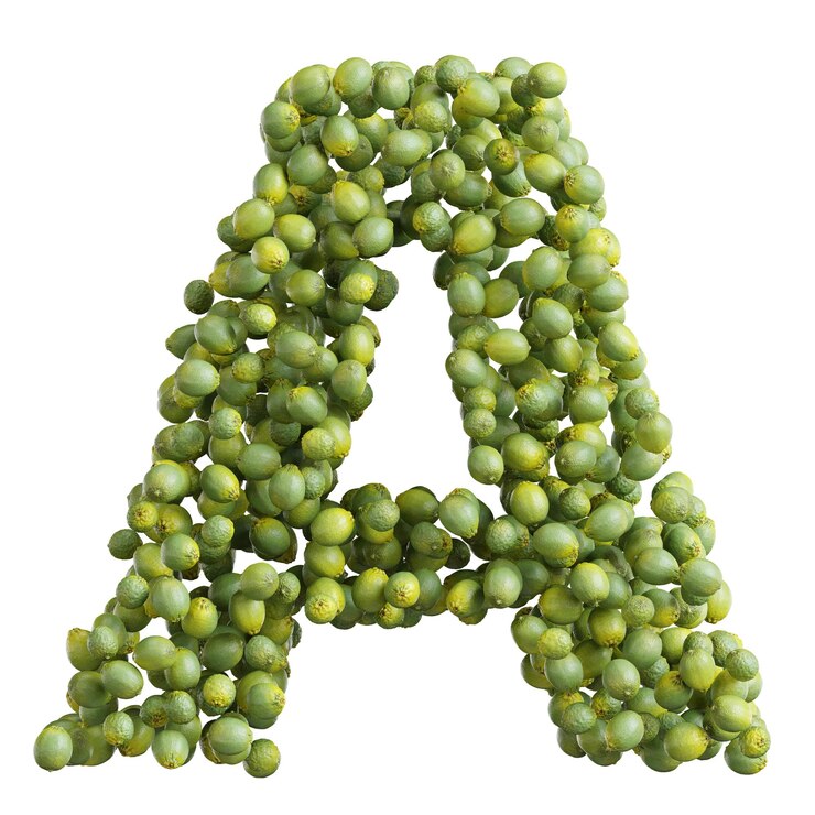 Foto alfabeto hecho de cal verde letra a