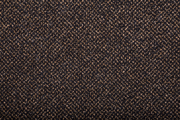 Alfombra cubriendo el fondo. Patrón y textura de la alfombra de color marrón. Copia espacio