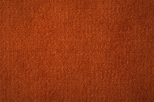 Alfombra de textura de tela naranja para el fondo