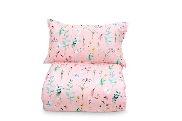 Una almohada rosa con un patrón floral.