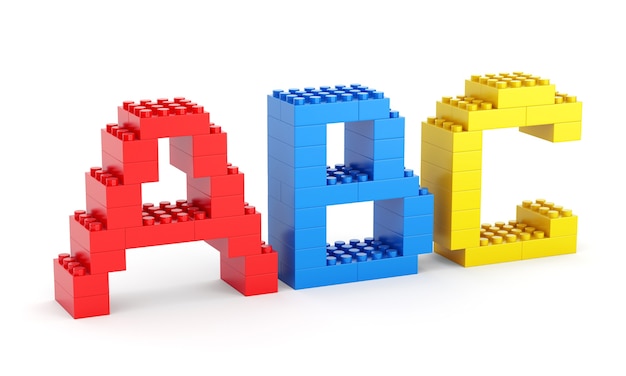 Alphabet ABC-Buchstaben aus Spielzeugbausteinen isoliert auf weißem Hintergrund. Zurück zum Schul- und Bildungskonzept.