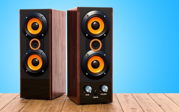 Los altavoces de la computadora en la mesa de madera renderización 3D