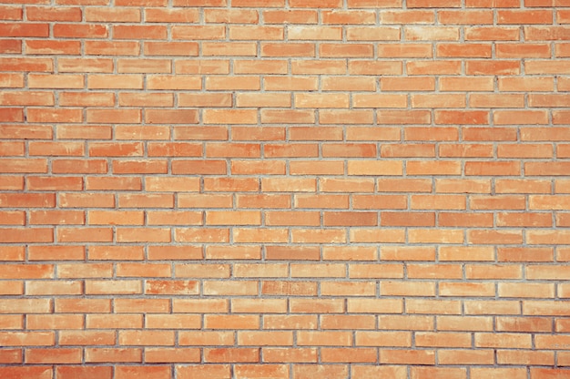 Alte rote Backsteinmauer Hintergrundbeschaffenheit