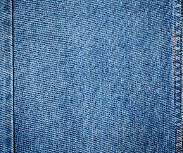 Alter blauer Jeanshintergrund und Beschaffenheit nah oben