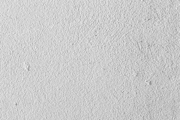 Alter Zementwandhintergrund Weiße Wandgrunge-Hintergrund.