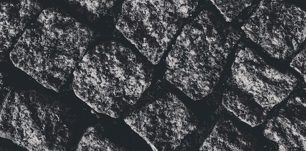 Foto altes rustikales steinpflaster strukturierter hintergrund architektonisches detailmaterial und abstrakte natürliche textur der bodenoberfläche für die mittelalterliche wand aus kieselsteinen