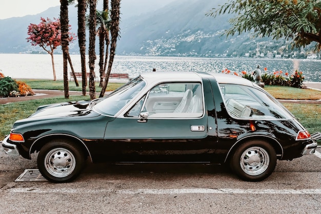 Foto amc pacer retro carro na rua de ascona. automóvel de luxo da american motor corporation. modelo antigo vintage de automóvel. estilo clássico e design antigo oldtimer