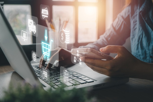 Añadir al carrito tienda web de internet comprar en línea concepto de comercio electrónico persona mano usando teléfono inteligente con gráfico de compras en pantalla VR compras en línea
