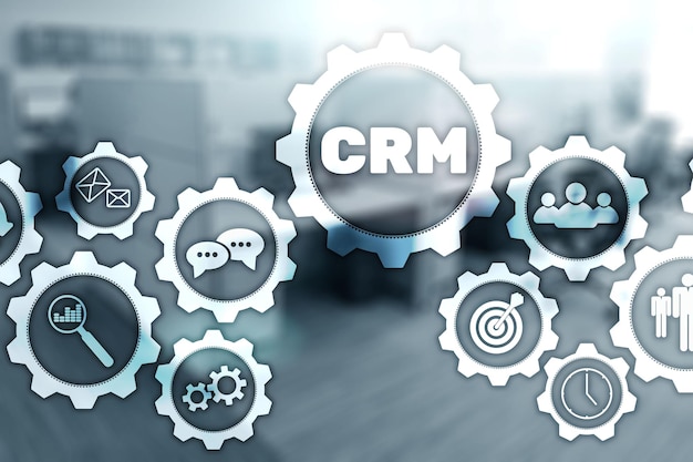 Análisis de la gestión de clientes del concepto de servicio de CRM Gráficos en un fondo de oficina borroso