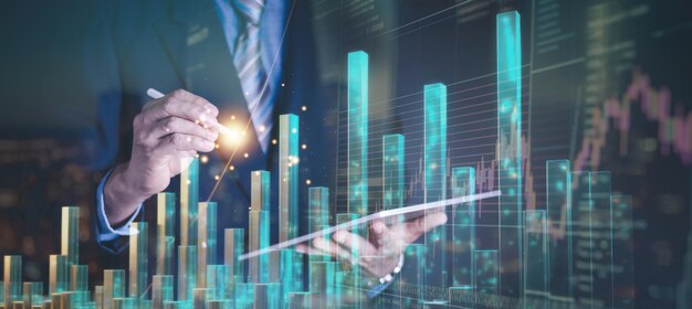 Análisis de negocios concepto de negociación Analista de finanzas de hombre de negocios usando tableta digital analizando gráficos financieros informe de mercado de valores gráfico económico gráfico de crecimiento antecedentes comerciales y tecnológicos