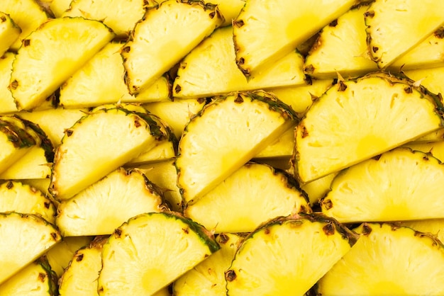 Ananas saftige gelbe Scheiben Hintergrund Draufsicht