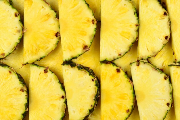Ananas saftige gelbe Scheiben Hintergrund