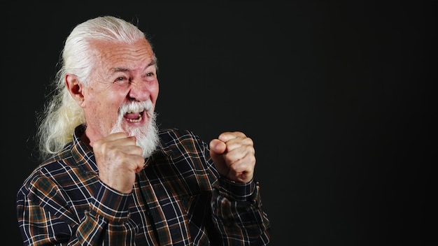 El anciano está mirando algo Emoción Foto