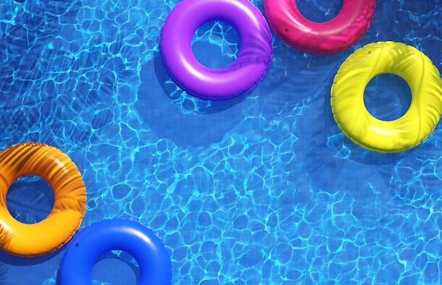 Anéis de natação multicoloridos na piscina