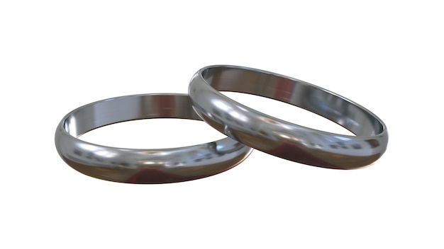 Anéis de noivado de prata sobre fundo branco. um acima do outro.