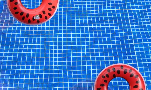 Foto anillos inflables de sandía flotando en la piscina