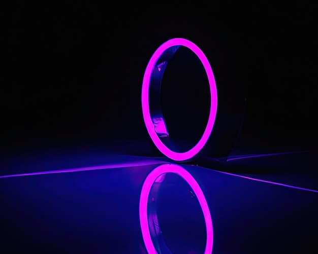 Anillos de luz rosa y azul magenta y turquesa con reflejos en el suelo fondo negro anillos de luz en movimiento