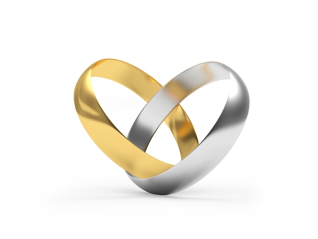 Los anillos de oro y plata están conectados en forma de corazón.