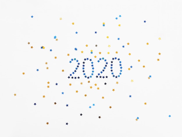 Ano novo 2020 fundo com números e confetes estrelas