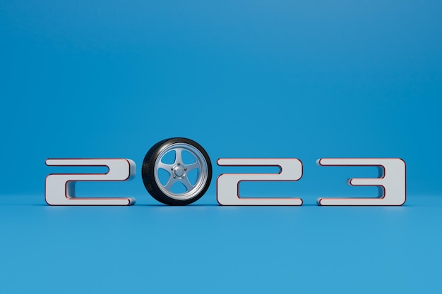 Ano Novo 2023 com conceito de pneu de carro a inscrição 2023 e uma roda de carro em um fundo azul