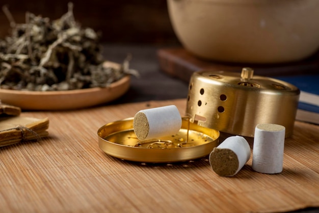 Antecedentes da moxabustão e fitoterapia chinesa