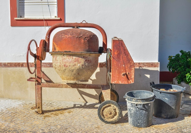 Antiga máquina misturadora manual