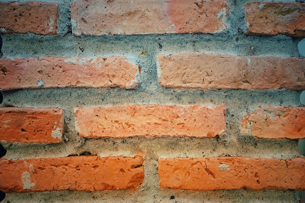 Foto antiga muralha de estilo brik vermelho