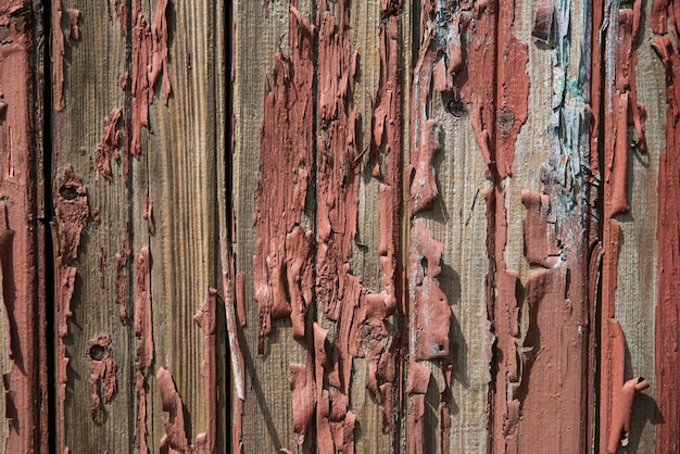 Antiga muralha de pranchas cobertas com tinta de madeira textura vintage