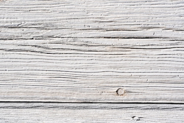 Antiga parede de madeira de cor clara para fundo e textura de madeira sem costura